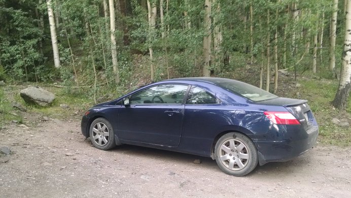 Honda Civic sitting at the Matterhorn Creek Trailhead