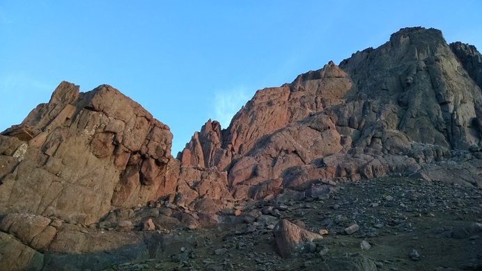 The notch in Wetterhorn Peak's summit ridge in the glow of sunrise