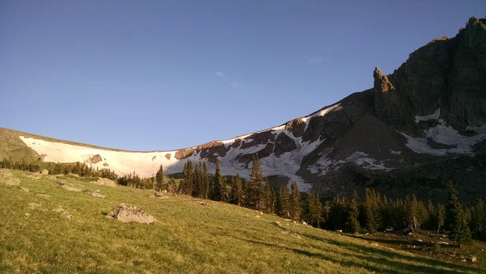 The ridgeline above Devils Thumb Lake, with Devils Thumb on the right.